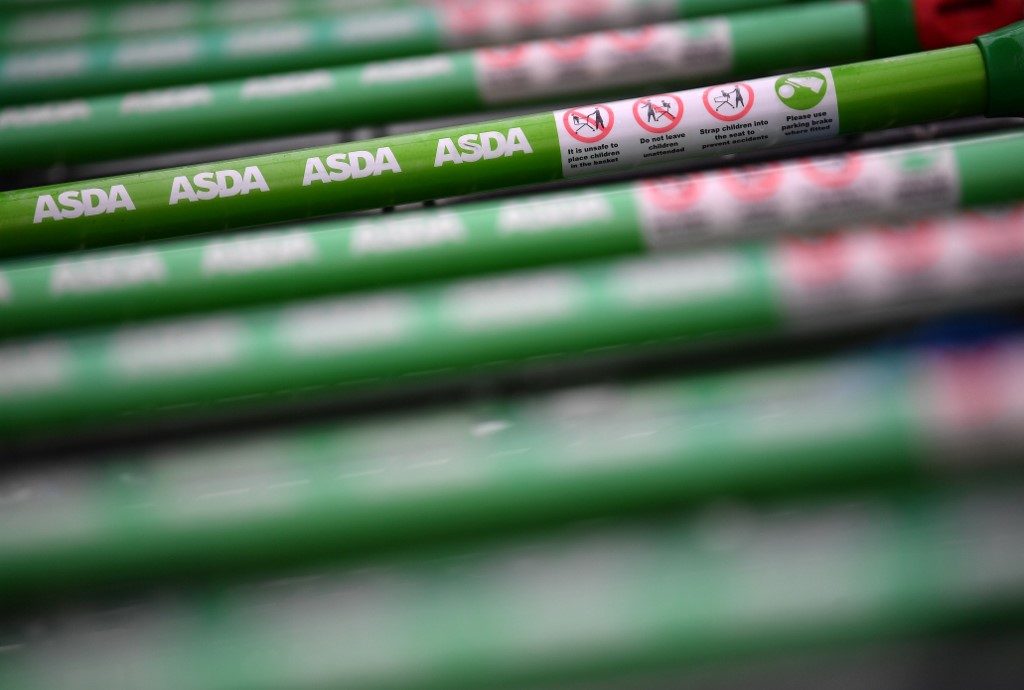 UK competition watchdog launches probe into Asda sale