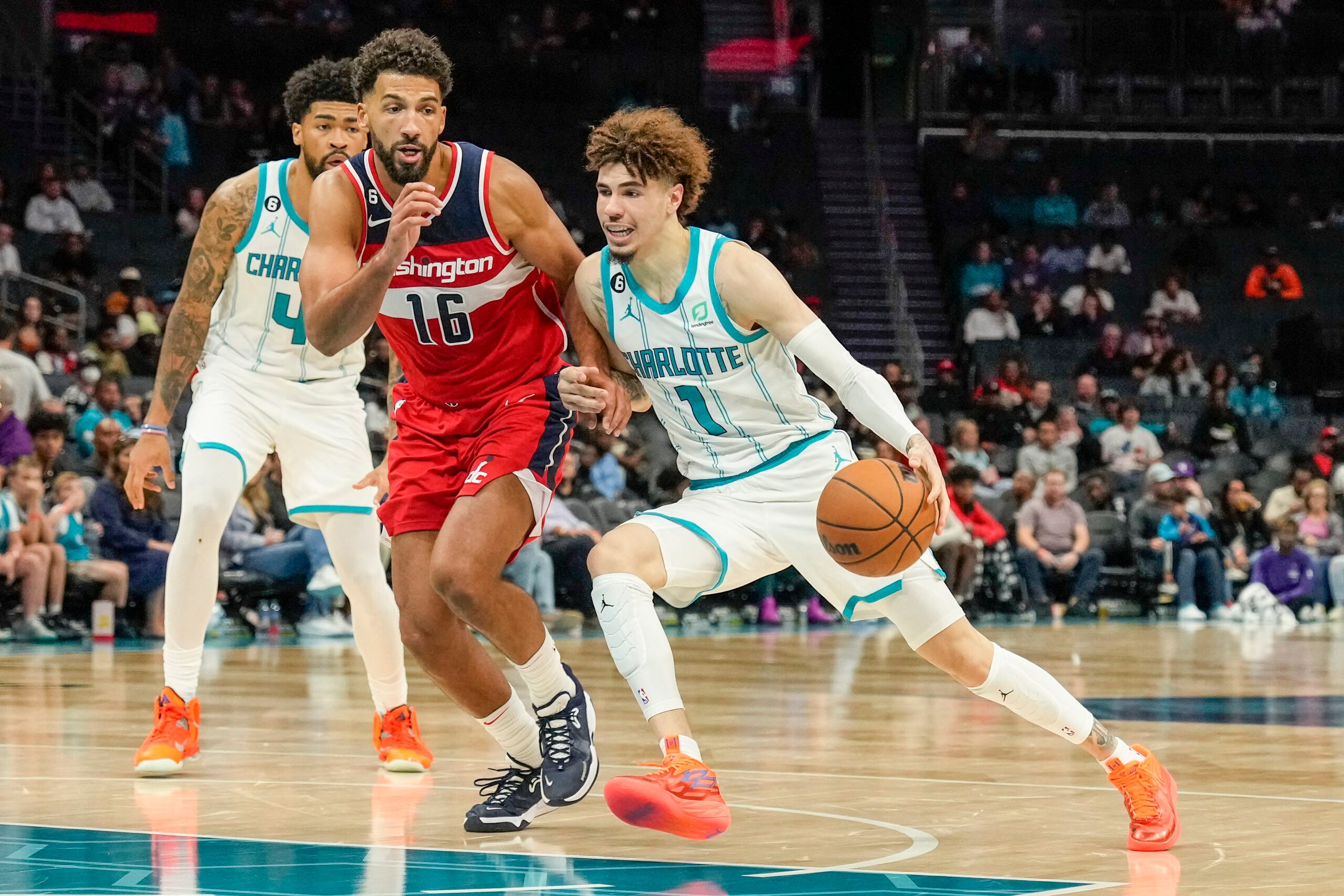 Hornets' LaMelo Ball makes eventful season debut: Buzzer-beating floater,  behind-the-back dime, lots of fouls 