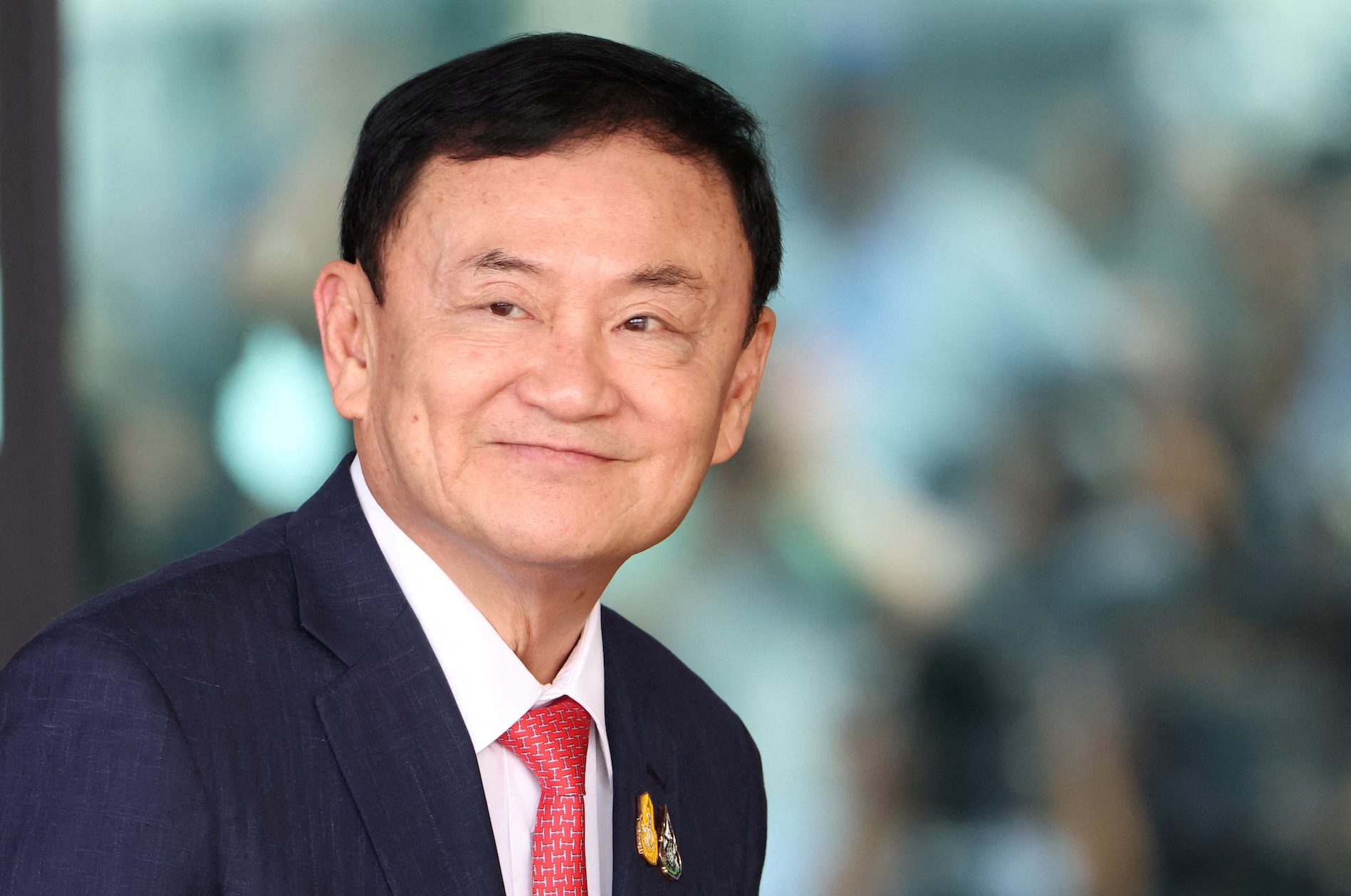Thai king commutes former PM Thaksin’s prison sentence to 1 year