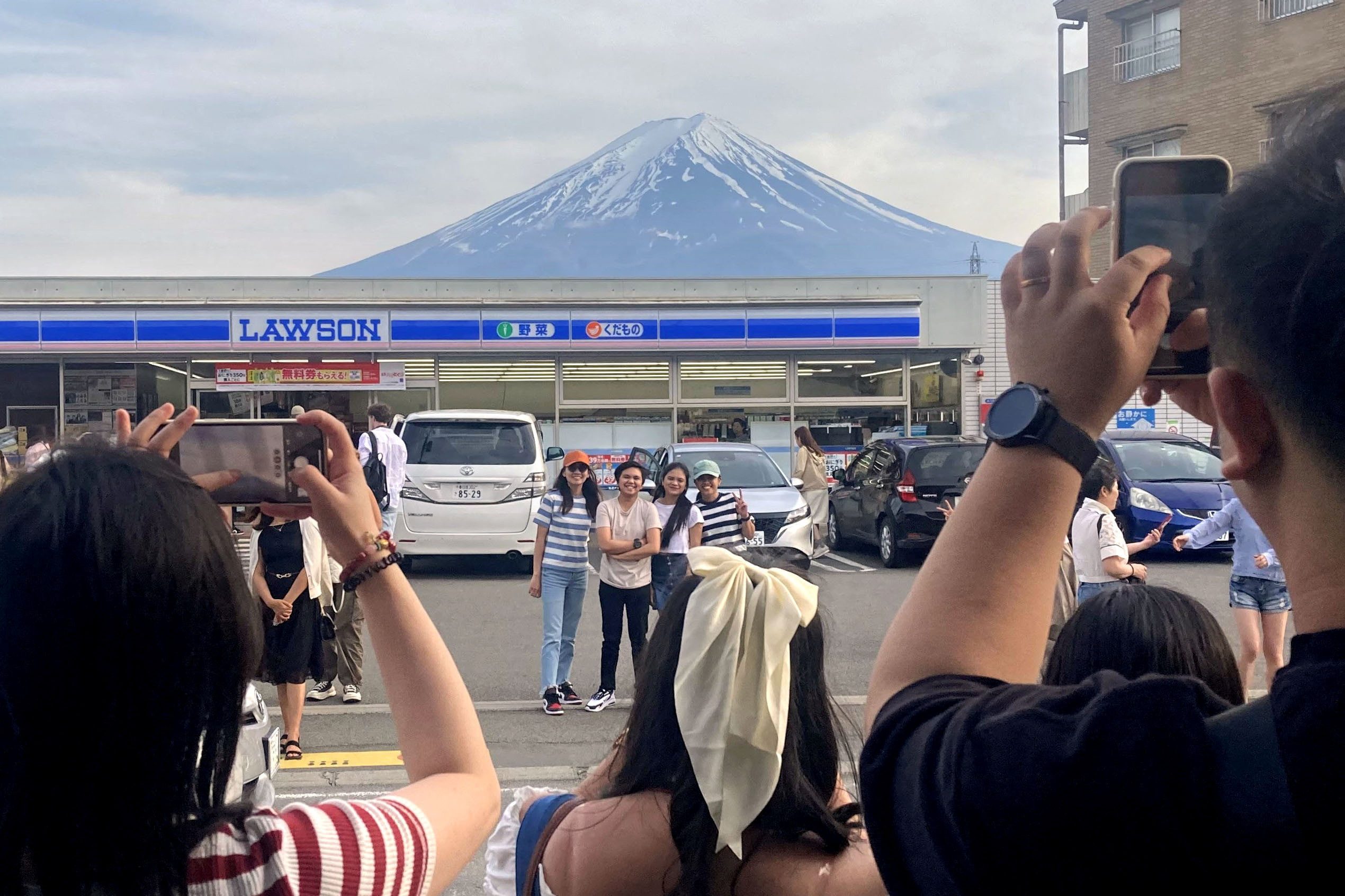 Japan town blocks view of Mount Fuji at tourist photo spot to stop crowds