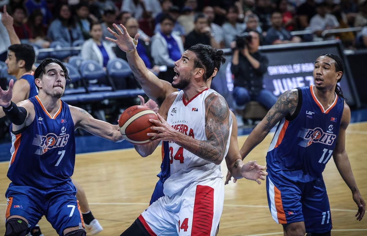 Ginebra battles negativity, turns back Meralco to close in on PBA finals