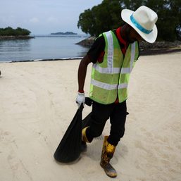 Singapore oil slick closes beaches on resort island
