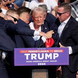 Trump shot in right ear at campaign rally, shooter dead