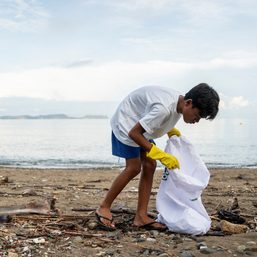 Philippine diving town swaps trash for rice to clean up its beaches