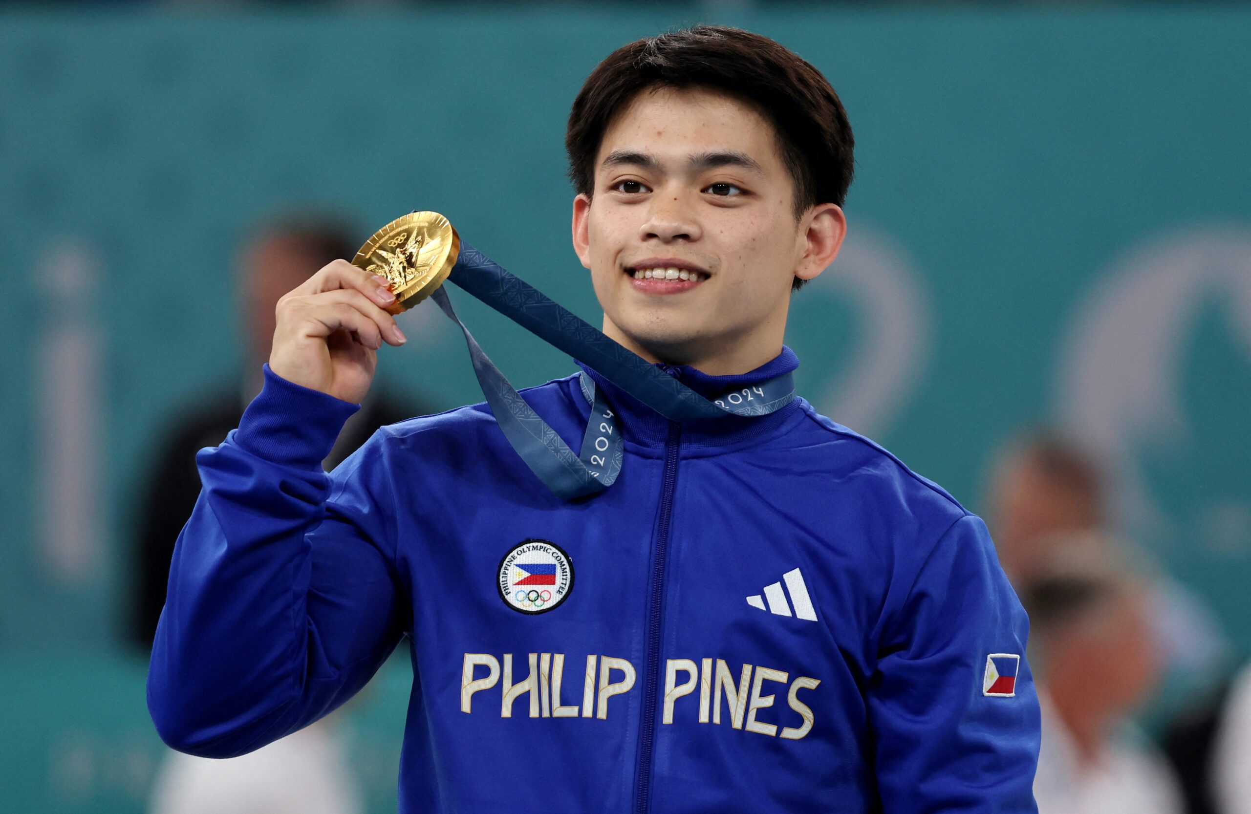 IN PHOTOS: Carlos Yulo relishes golden Olympic moment
