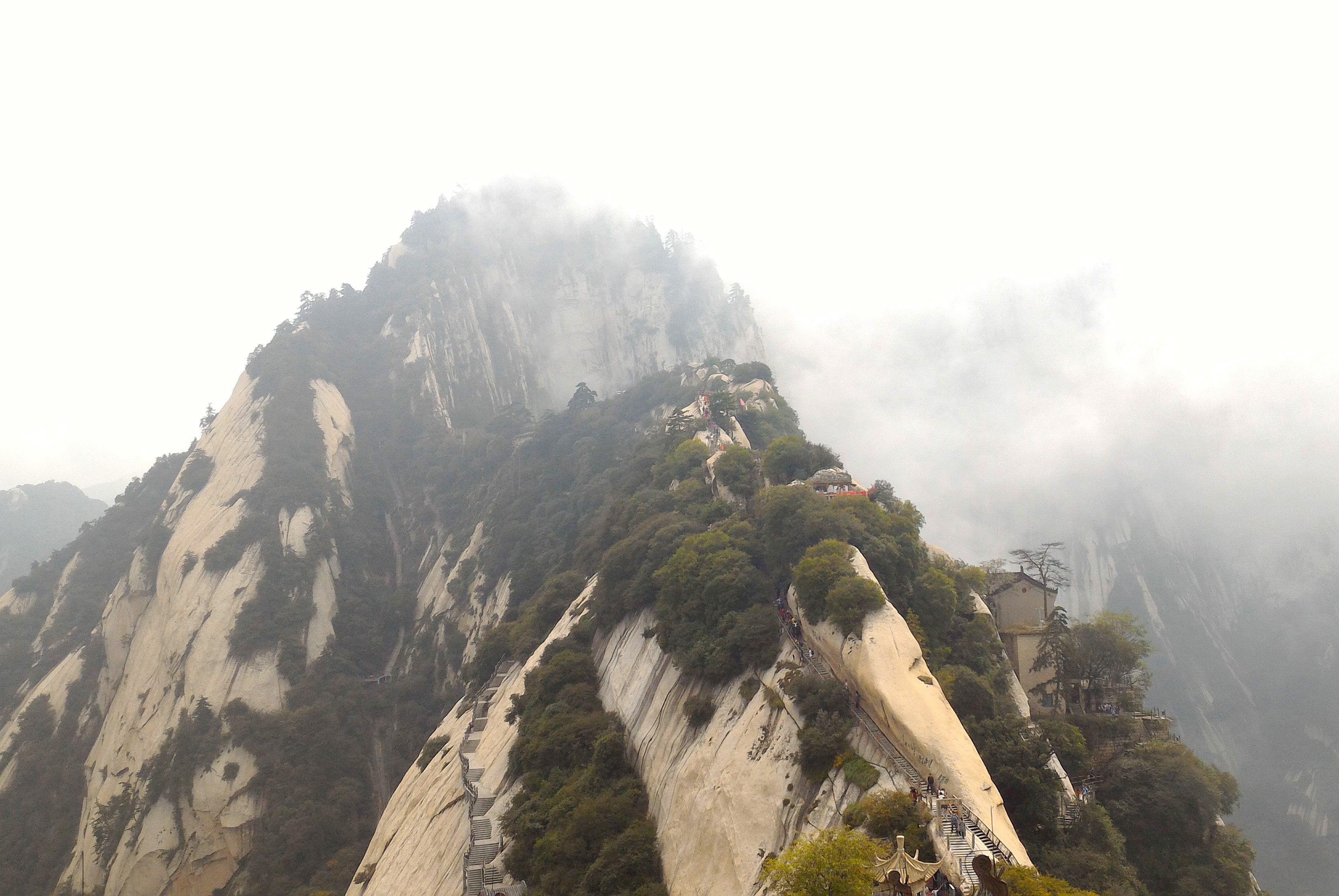 HIKING FOR HOURS. A huge number of locals and tourists trek their way up Mount Hua. Some opt to ride the cable car but this will only take you to the lowest peak. Photo by Pauline Buenafe
 