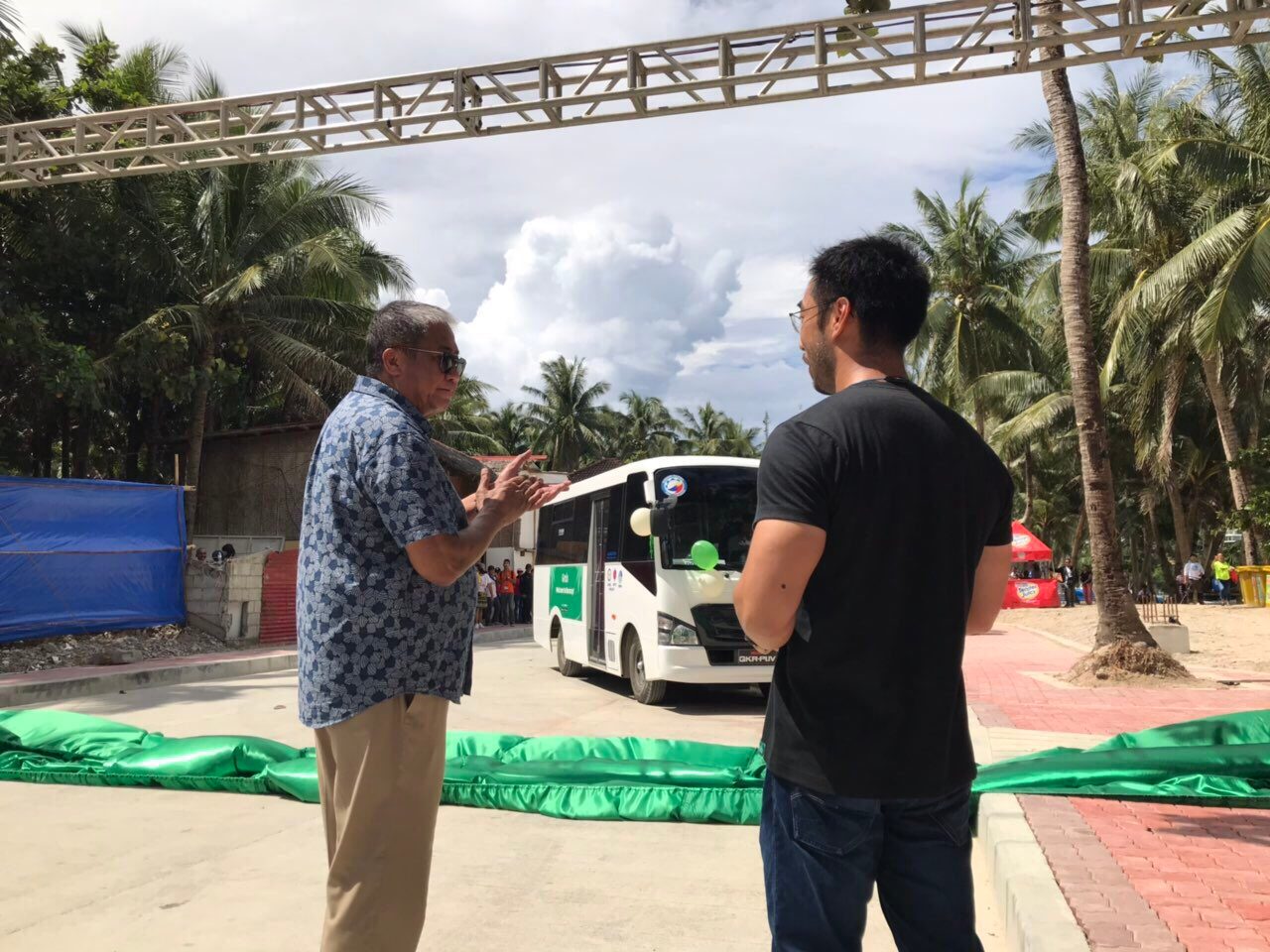 HOP-ON, HOP-OFF. Transportation Secretary Arthur Tugade and Grab Philippines head Brian Cu unveil the new hop-on, hop-off bus in Boracay. 