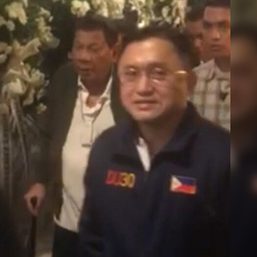 Cane-bearing Duterte visits Nene Pimentel wake
