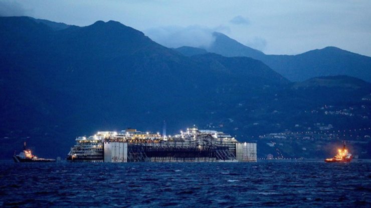 Wrecked Costa Concordia arrives at final port of call