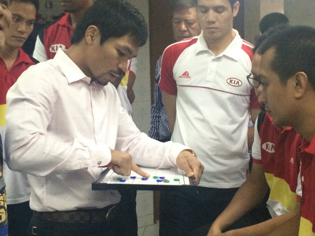 Manny Pacquiao memasang wajah permainan saat kamp pelatihan sudah dekat