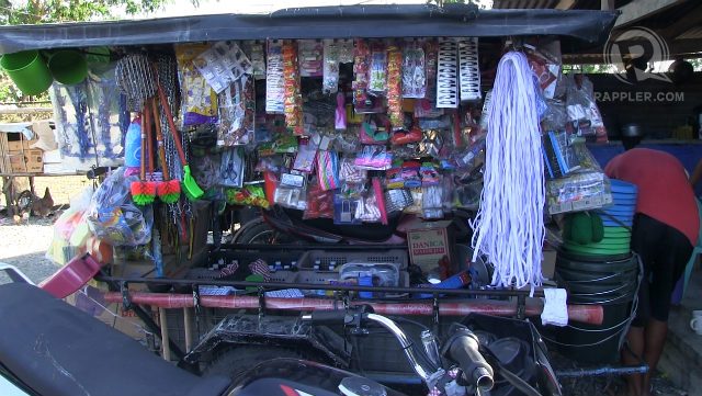 BUSINESS. Mary Jane Veloso's parents sell assorted items on their on-the-wheels store. Photo by Buena Bernal/Rappler  