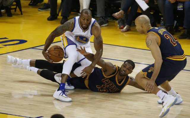 Andre Iguodala (L) gets plenty of rest but never turns his motor off. Photo by Monica Davey/EPA 