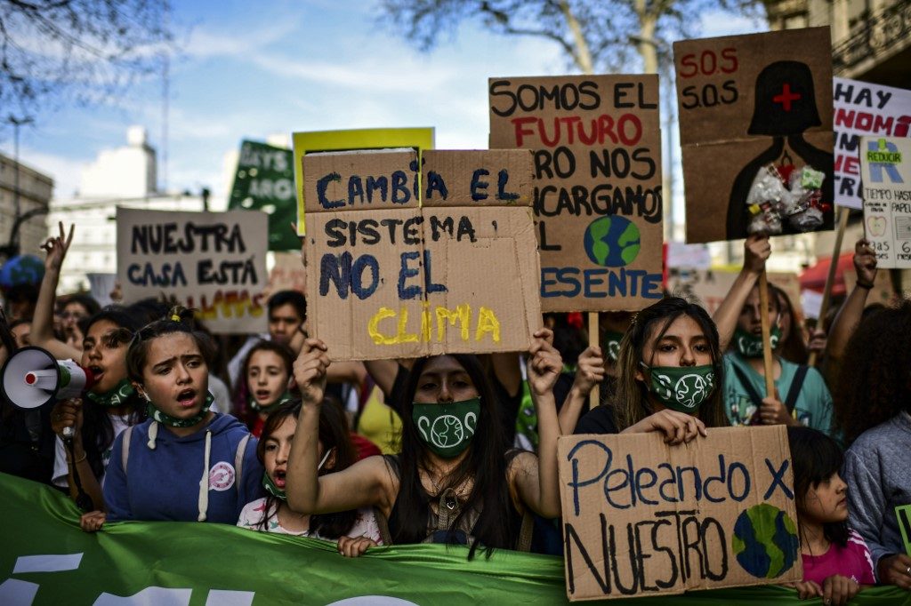RAGE TO ACTION. Demonstrators take part in a global youth climate action strike in Buenos Aires, on September 27, 2019, at the end of a global climate change week. File photo by Ronaldo Schemidt/AFP 
