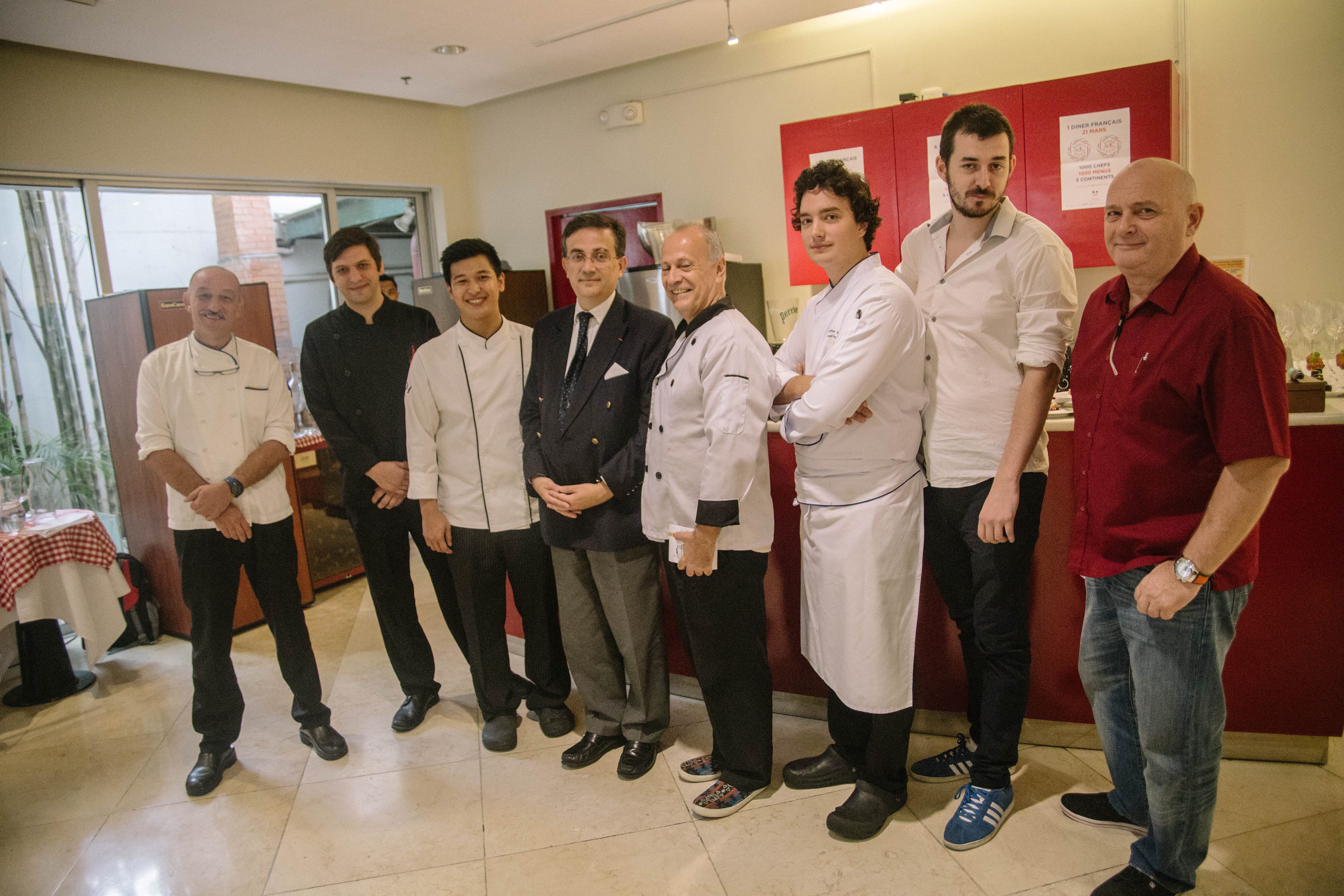 Left to right: Chef Marc Aubry of Champetre Boutique & Restaurant, Chef Julian Koeberl of L'Aubergine, Chef Justin Baradas of Restaurant 101, French Ambassador Thierry Mathou, Chef Michel Herbert of Le Bistro d'Agathe, Chef Paul Cottanceau-Pocard of Spiral, Chef Adrien Guerrey of La Maison Rose, and Chef Pierre Cornelis of Vatel Restaurant   