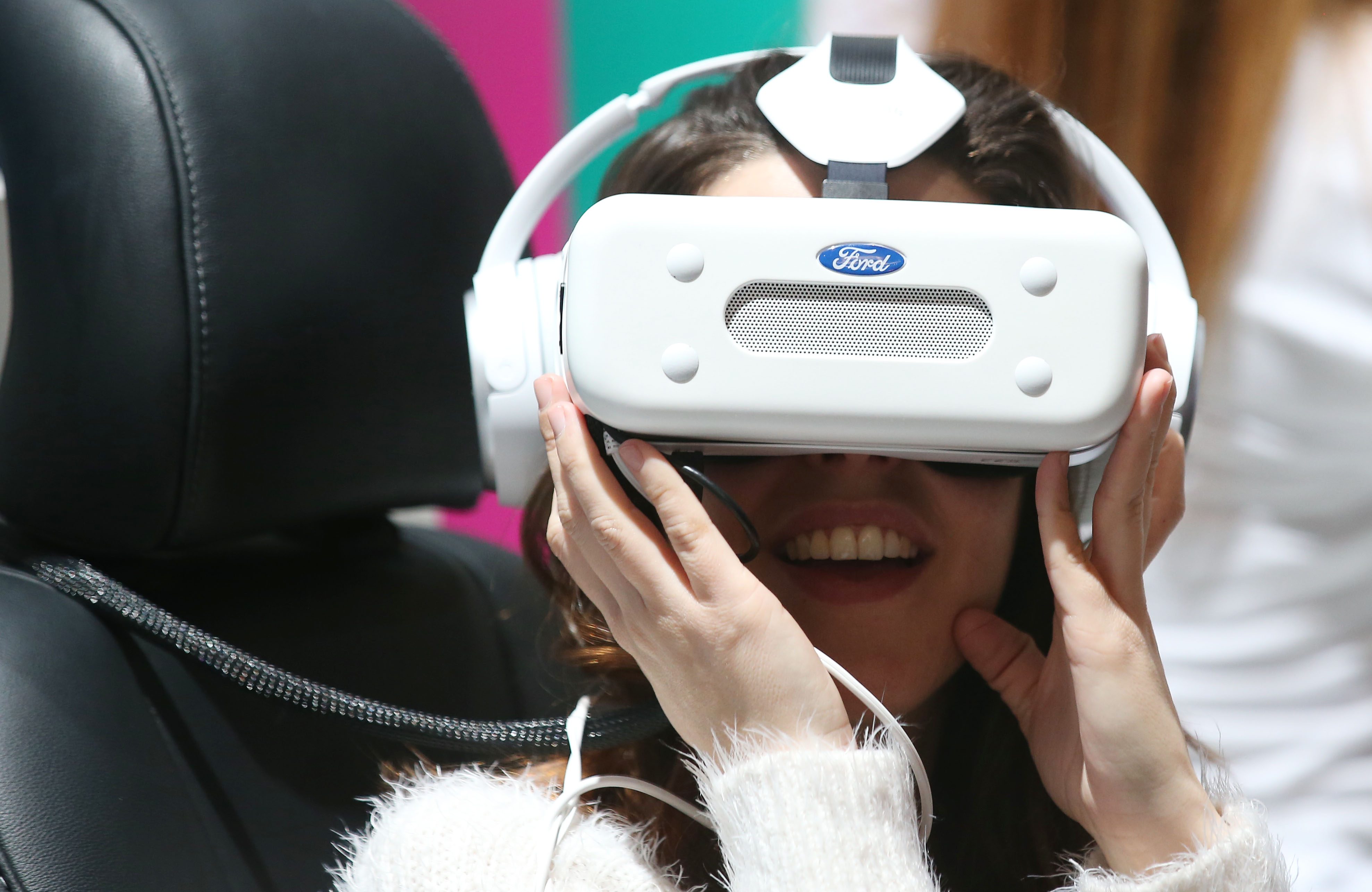 NEW EXPERIENCE. A woman uses a virtual reality device during the Mobile World Congress in Barcelona, Spain, February 23, 2016. Photo by Yonhap/EPA  
