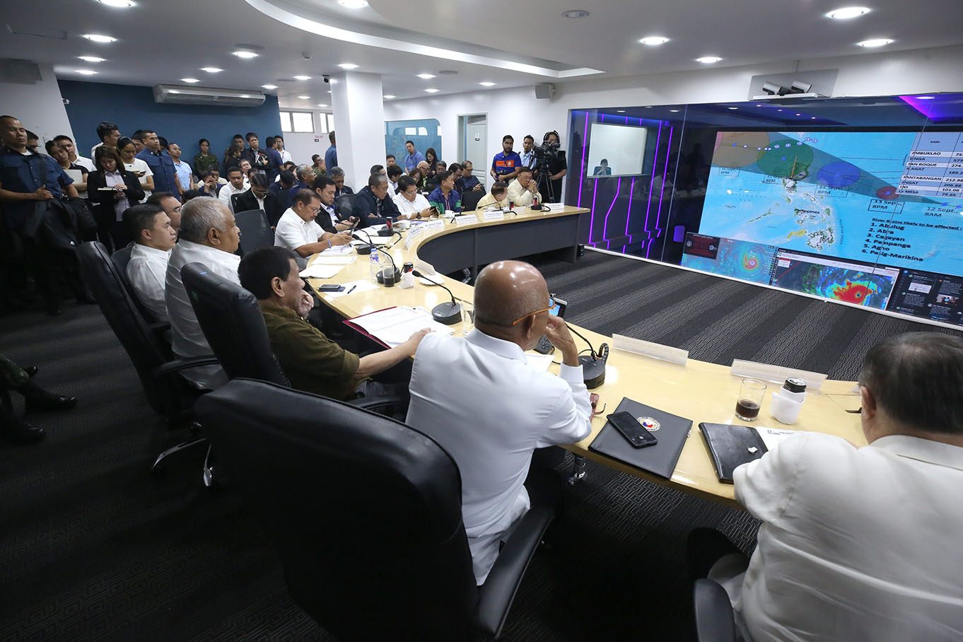 President Rodrigo Roa Duterte oversees the disaster preparedness measures for Typhoon 'Ompong' as he presides over a command conference with the members of his cabinet at the National Disaster Risk Reduction and Management Council (NDRRMC) office in Camp Aguinaldo, Quezon City on September 13, 2018. TOTO LOZANO/PRESIDENTIAL PHOTO
 