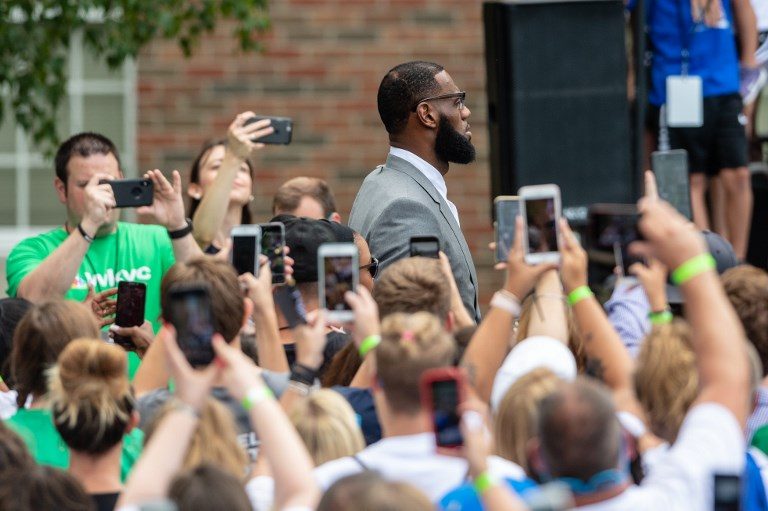 STRIVE FOR GREATNESS. LeBron James gives back to his hometown so that kids can discover their own big dreams. Photo by Jason Miller/Getty Images/AFP 